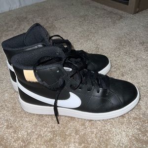 Black high top Nikes, size 7.
